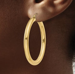 14 Karat Yellow Gold 4mm Tube Hoop Classic Earring. 40mm in length