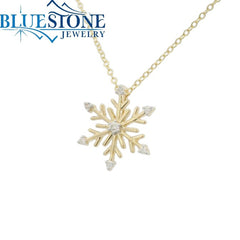 14 Karat Yellow Gold Snowflake Pendant with 7 Round Diamonds at 0.10 C