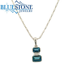 14 Karat White Gold Pendant With Two Bezel Set London Blue Topaz Gemst
